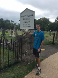 Kirk Zimmer Jr. paints Mount Carmel Cemetery fence to earn Eagle Scout badge