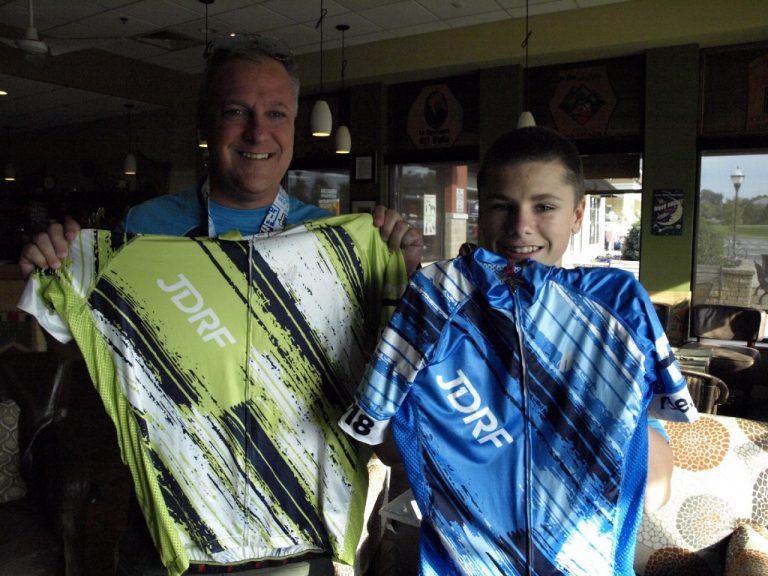 Father-son duo bikes for a cure