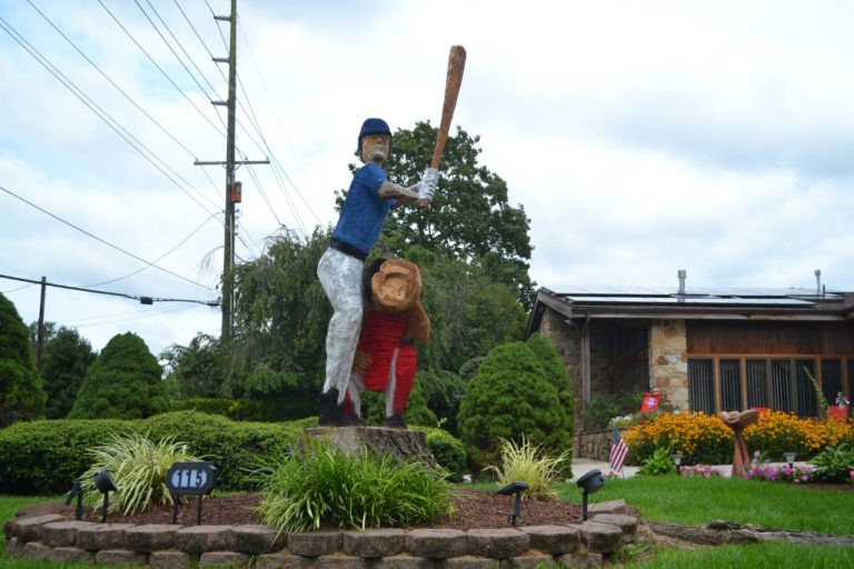 Baseball-themed tree carving in Berlin resident’s yard a home run with neighbors
