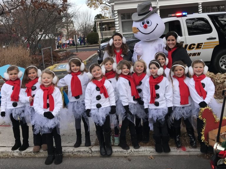 Daisies use parade to spread winter warmth