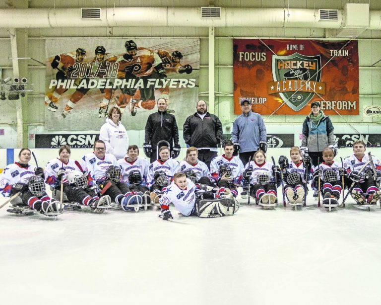 Sledding with smiles: Local sled hockey team gets differently abled kids on the ice