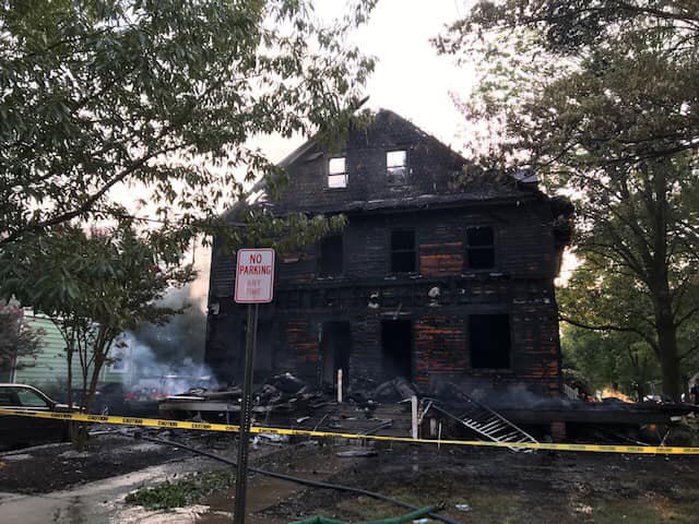 Early-morning two-alarm fire claims pair of homes on Walnut Street