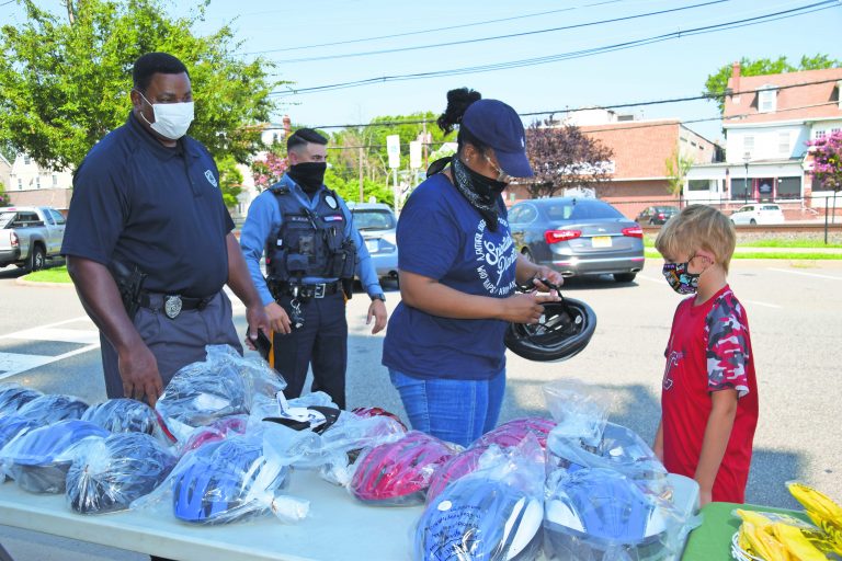 A head start for bike safety: Palmyra Police, Cross County Connection team up for helmet giveaway