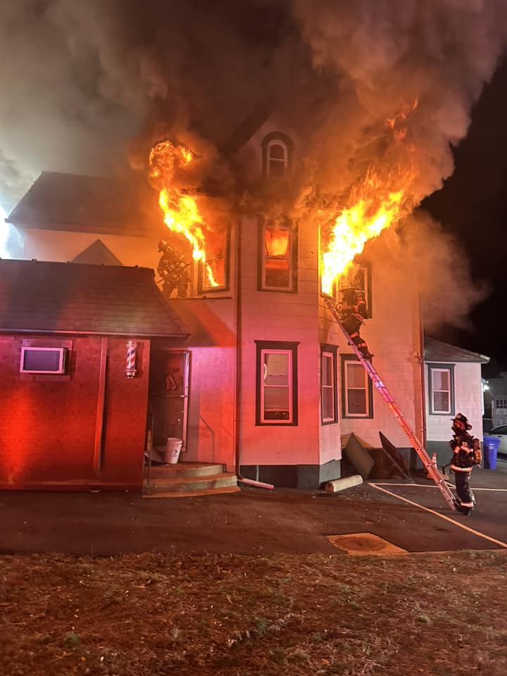 Barbershop and its building suffer  heavy fire