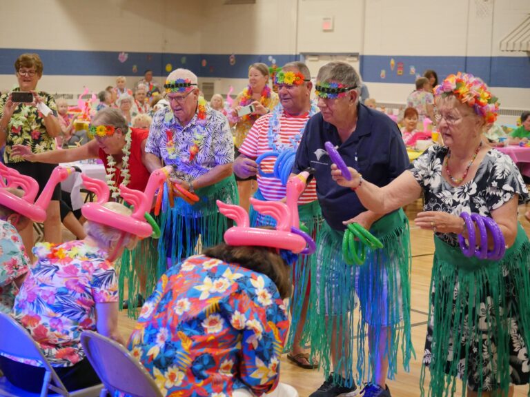 ‘Open arms’: Seniors welcomed at  township’s annual luau party