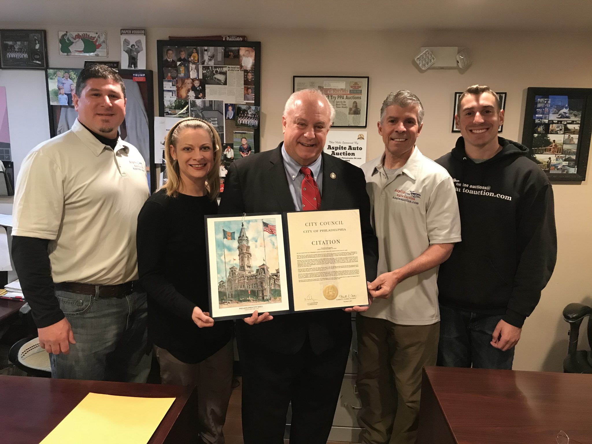 Taubenberger presents Aspite Auto Auction with Council citation