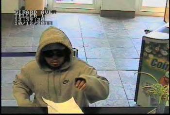 Robber hits Girard Avenue bank