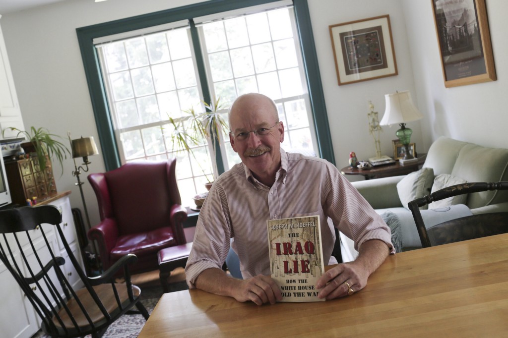 KEVIN COOK / FOR THE WIRE  Former U.S. Rep. Joe Hoeffel holds a copy of his book, "The Iraq Lie: How the White House Sold the War," which was published in July. In the book, he explains “the biggest mistake” of his political career occurred in 2002 while he was representing Pennsylvania’s 13th Congressional District and voted to authorize preemptive war on Iraq.html-charsetutf-8