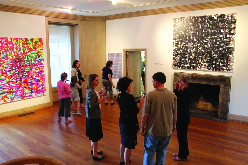 A reception was held on June 5 for Abington Art Center’s Summer Solo series, which exhibits the work of four contemporary artists. Above, a piece by Florence Moonan utilizes vinyl records in her artwork. Center, patrons peruse the gallery of William DiBello. At far right, many paintings by artist Gerard Brown include manipulation and combination of signal flag images.html-charsetutf-8