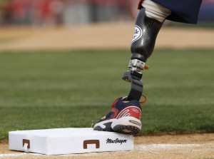 A Wounded Warrior Softball Team base runner waits to tag up at third in Binghamton New York