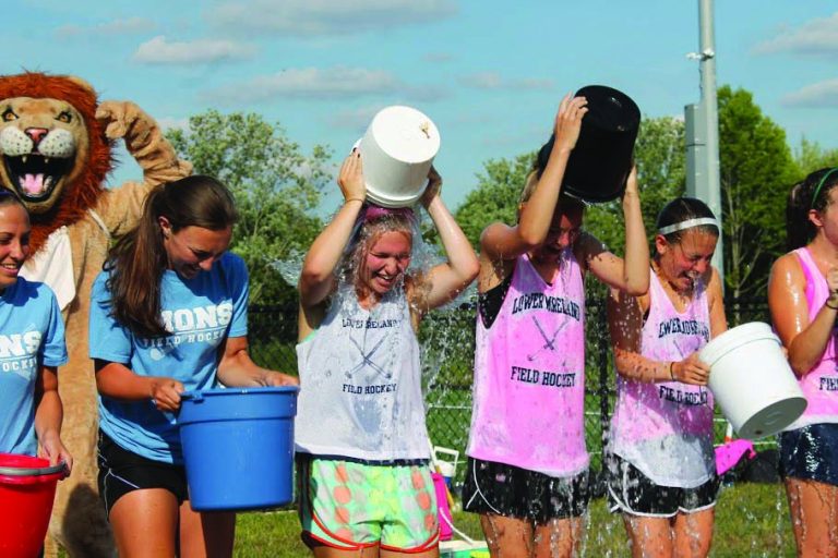 Challenge accepted: Lower Moreland High School field hockey team takes on ice bucket challenge for dad with ALS