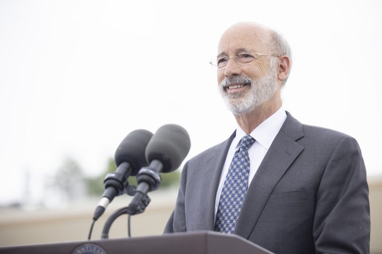 Wolf outlines plan to improve worker pay, sick leave, protections