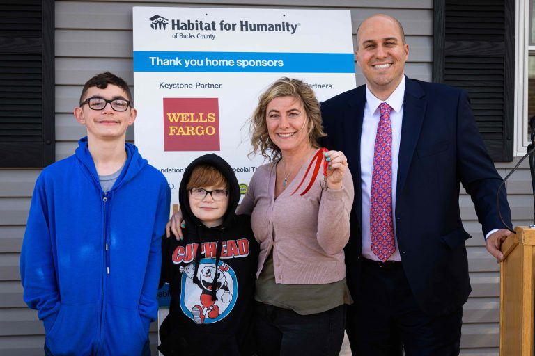 Habitat for Humanity celebrates dedication of 124th home